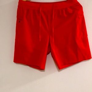 Lululemon orange men’s shorts never worn